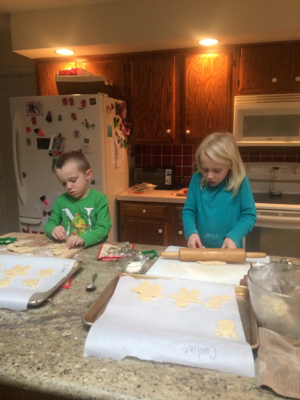 The kids make and decorate sugar cookies.
